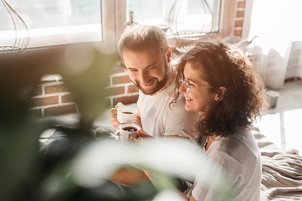 Happy couple enjoying benefits of combi boiler?